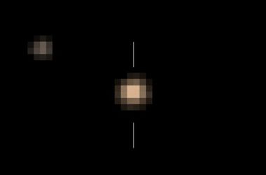 Опубликованы первые цветные снимки Плутона